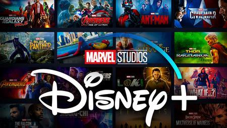 Disney Plus logo, Marvel Studios logo in front of Marvel Movie thumbnail posters