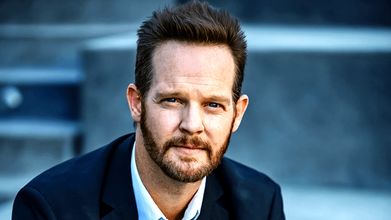 A headshot of Jason Gray-Stanford