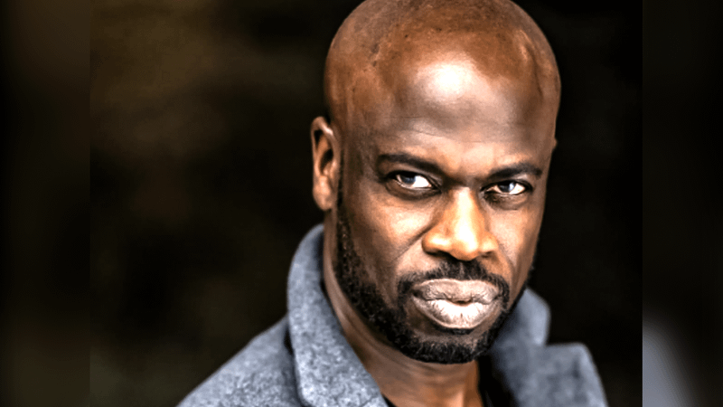 A close-up headshot of Garfield Wilson